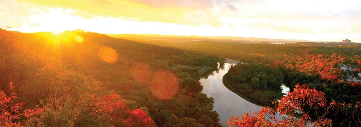 Sunset and fall colors along the river in Branson, Missouri